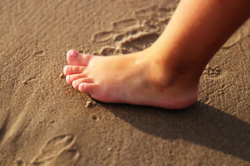 feet on the beach