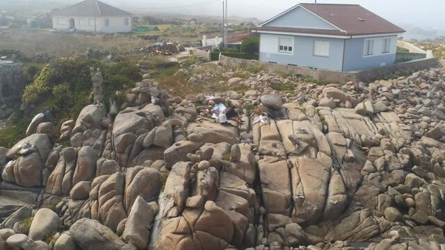 Rocky coast in Galicia with fog. Aerial Drone Footage