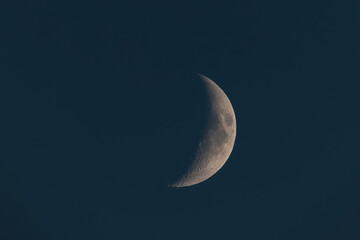Obraz na płótnie Canvas Crescent moon on dark night sky