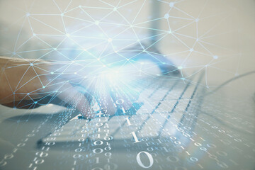 Obraz premium Double exposure of data internet theme hologram with man working on computer on background. Concept of innovation.
