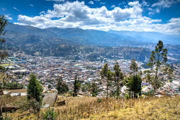 City of Guaranda, Chimborazo Province, Ecuador, taken from a high view point on a beautiful summer morning.