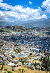 Fototapeta na wymiar City of Guaranda, Chimborazo Province, Ecuador, taken from a high view point on a beautiful summer morning.