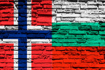 Flag of Norway and Bulgaria on brick wall