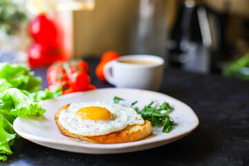 fried egg and toast bread salad delicious breakfast snack yolk and protein portion serving food background top view copy space eating healthy raw Takeaway