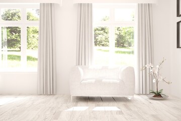 Fototapeta premium Idea of white room with armchair and summer landscape in window. Scandinavian interior design. 3D illustration