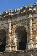 Obraz premium Ancient Nimes Roman Amphitheatre. Nimes Arena (70 CE) - one of the best-preserved amphitheaters in the world. Nimes, Occitanie region of southern France.