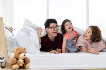 Fototapeta premium Mother, Father and disable kid in family.