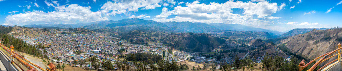 Fototapeta na wymiar Panoramic view of the city of Guaranda, in the Chimborazo Province in Ecuador, South America, on a beautiful summer morning.