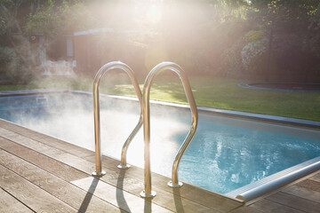 Sunny summer swimming pool