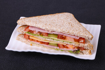 Club sandwich with ham and cheese