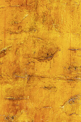 Abstract creative background of chaotic strokes of old cracked paint on concrete wall. Old surface with traces of paint, weathered, scratches and cracks for design