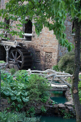 Old Stone grist mill with a mill wheel