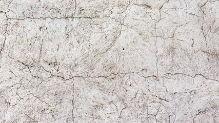 Abstract concrete, weathered with cracks and scratches. Grungy Concrete Surface. Great background or texture.