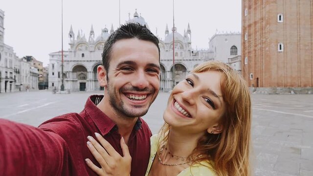 Young couple in Venice. Lifestyle travel moments in the beautiful italian city. Concepts about Venezia and Burano