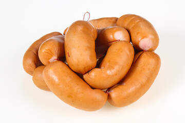 Tasty meat sausages over white background