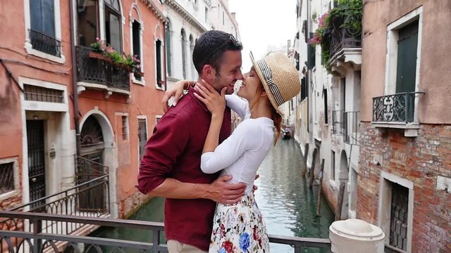 Young couple in Venice. Lifestyle travel moments in the beautiful italian city. Concepts about Venezia and Burano