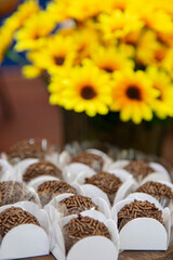 Brigadeiro at the decorated birthday table, traditional Brazilian party candy.