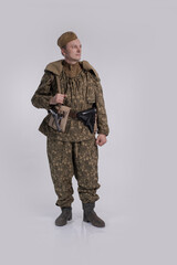 Male actor in the uniform of an officer of the army reconnaissance group of the Soviet Army during...