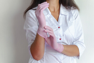 Female hands in rubber gloves, close up