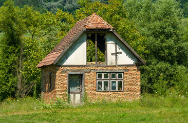 an abandoned house in the field
