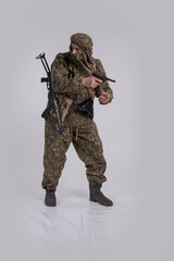 Male actor in the uniform of an officer of the army reconnaissance group of the Soviet Army during...