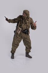 Male actor in the uniform of an officer of the army reconnaissance group of the Soviet Army during...