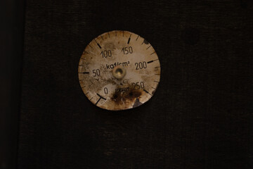 The dials of the old antique classic clocks on a vintage paper background. Concept of time, history, science, memory, information. Retro style. Vintage clockwork background.