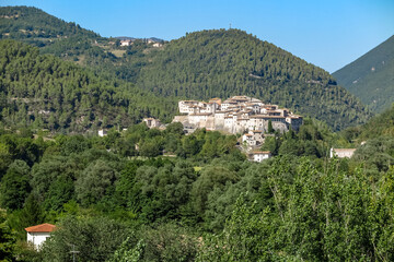 Fototapeta na wymiar Ancient fortified village from the 12th century, on top of a hill, between forest and mountains, Castel San Felice, Umbria region, Perugia province, Italy
