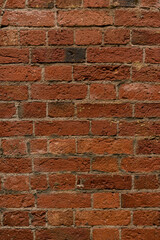 Obraz premium brick red wall. background of a old brick house.