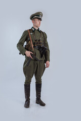 Male actor reenactor in historical uniform as an officer of the German Army during World War II