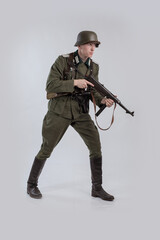 Male actor reenactor in historical uniform as an officer of the German Army during World War II