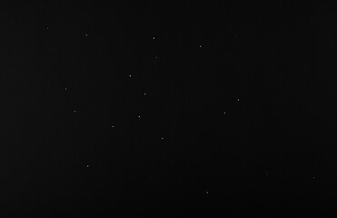 Obraz premium texture abstract space paper black background with white holes with blank space