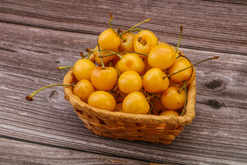 Sweet ripe yellow cherry heap