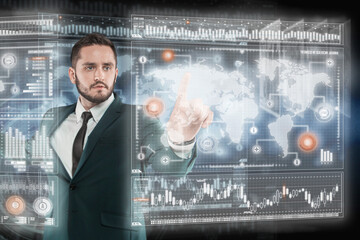 Businessman works with virtual holographic interface. Future technology concept
