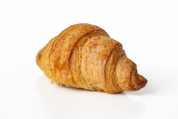 Croissant with a Golden crust, on a white background