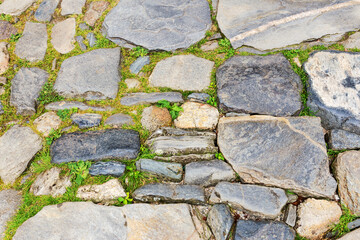 Urban stone paving. Texture, background, selective focus