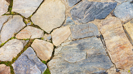 Urban stone paving. Texture, background, selective focus