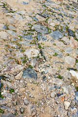 Urban stone paving, perspective. Texture, background, selective focus