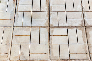 Urban stone paving. Texture, background, selective focus