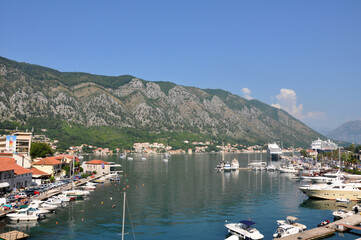 Fototapeta na wymiar Kotor, Montenegro, 08.06.2019 - Old town, view of the Bay and ancient buildings.