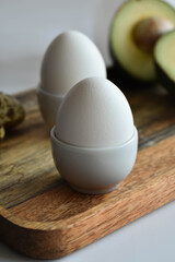 eggs in a bowl with avocado for breakfast