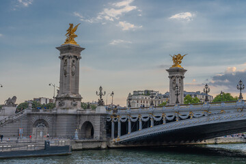 Paris, France - 07 17 2020: View of bridge from a boat on the Seine