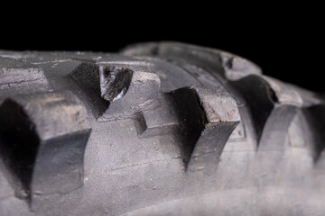 Damaged tread in a motocross tire. Damaged tire with high tread.
