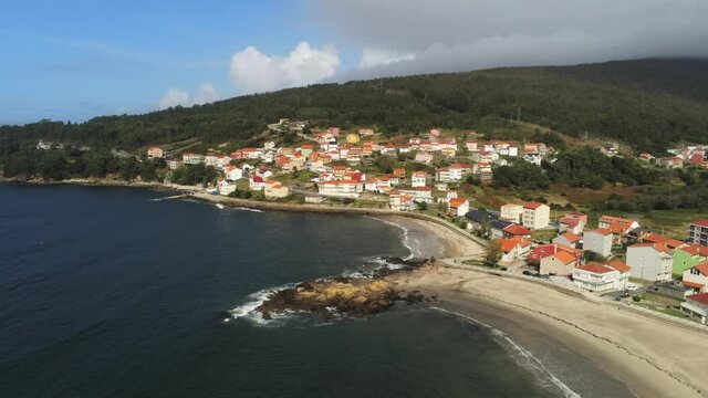 Beautiful beach in Ezaro, coastal village of Galicia,Spain. Aerial Drone Footage