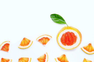 High vitamin C. Juicy grapefruit slices with leaf on white