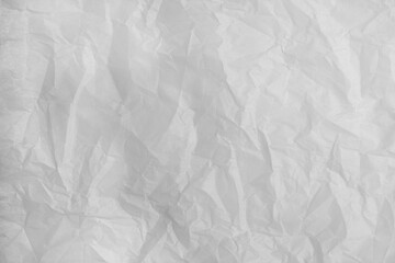 abstract background of crumpled white parchment texture close up