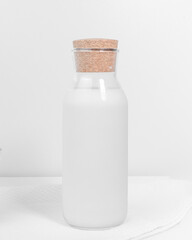 white plastic bottle with lid