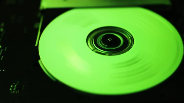 CD rom with green rgb lights and a cd that inside turns