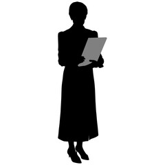 woman in long dress and shoes is standing