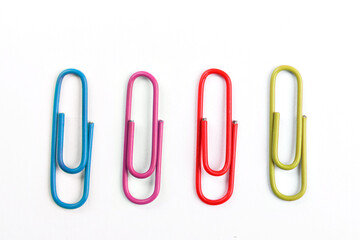 multicolor paper clip isolated on white background